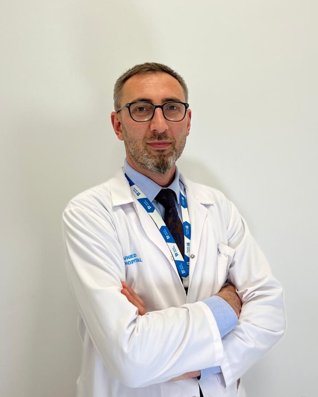 Dr. Arian Bujupi